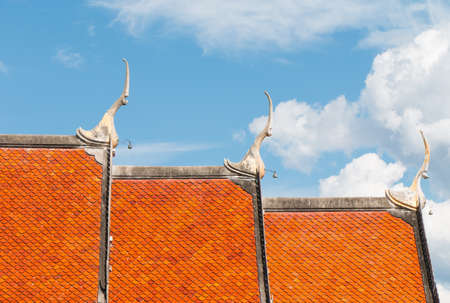 Orange roof of Thai temple, asian styleの写真素材