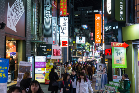 SEOUL SOUTH KOREA - OCT 30: Myeong-dong night market, the famous shopping area were crowd with many tourist from around the world on October 30, 2016 in Seoul, South Koreaのeditorial素材