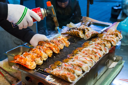 burning lobster in Korean street food, myeongdong night marketの写真素材