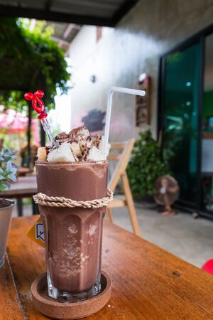 cocoa frappe with sliced bread, dessert menu in Thai cafeの写真素材