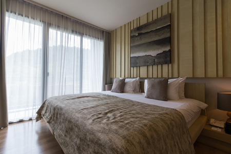 NAKHONRATCHASIMA THAILAND - JUL 15: Lovely bedroom in a hotel, idea for home decoration on July 15, 2017 in Nakhonratchasima, Thailandのeditorial素材