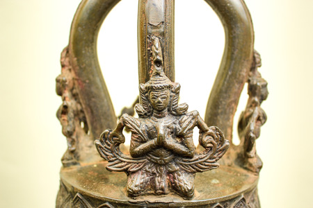 temple bell decorate many fairy sculpture on topの写真素材