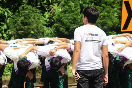 Chiang Mai, Thailand - September 12, 2015: student from Chiang Mai university CMU   boom and show power of their faculty in Freshmen Welcoming Ceremony of CMU at Doi suthep temple on September 12, 2015 in Chiang Mai, Thailand.のeditorial素材