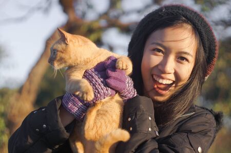 naughty girl catch naughty catの写真素材