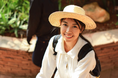 Girl travels happily in botanical garden, Thailandの写真素材