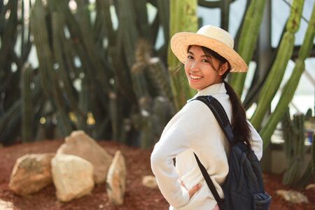 Girl travels in cactus glass house at botanical garden, Thailandの写真素材