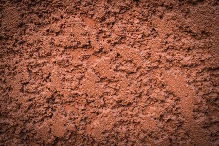 orange wall plaster background, vintage style pictureの写真素材
