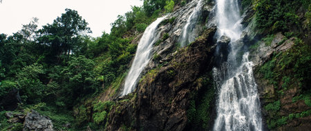 Wide anamorphic shot of waterfall in Khong Lan, Thailand