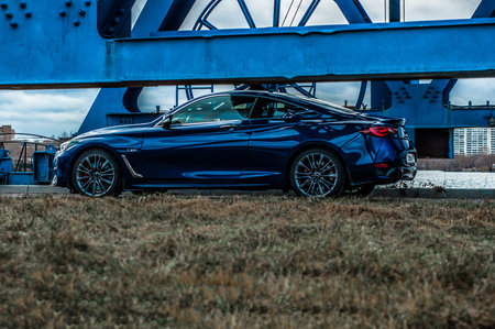 MOSCOW, RUSSIA - JANUARY 8, 2018 INFINITI Q60 coupe car, front-side view. Test of new car - Infiniti...