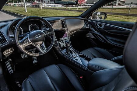 MOSCOW, RUSSIA - SEPTEMBER 1, 2017 INFINITI Q60 coupe car, interior view. Test of new car - Infiniti Q60 Coupe. Business-class saloon and V6 engine. The premium sports coupe. 405-horsepower V6 engine.のeditorial素材