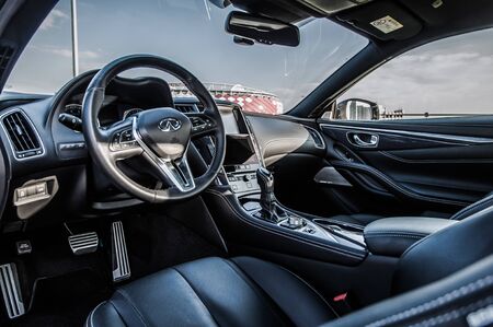 MOSCOW, RUSSIA - SEPTEMBER 1, 2017 INFINITI Q60 coupe car, interior view. Test of new car - Infiniti Q60 Coupe. Business-class saloon and V6 engine. The premium sports coupe. 405-horsepower V6 engine.のeditorial素材