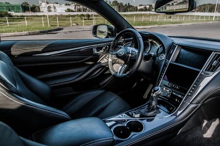 MOSCOW, RUSSIA - SEPTEMBER 1, 2017 INFINITI Q60 coupe car, interior view. Test of new car - Infiniti Q60 Coupe. Business-class saloon and V6 engine. The premium sports coupe. 405-horsepower V6 engine.のeditorial素材