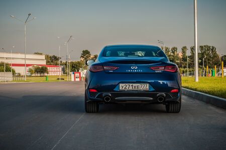 MOSCOW, RUSSIA - SEPTEMBER 1, 2017 INFINITI Q60 coupe car, front-side view. Test of new car - Infiniti Q60 Coupe. Business-class saloon and V6 engine. The premium sports coupe. 405-horsepower V6 engine.のeditorial素材