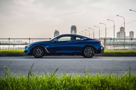 MOSCOW, RUSSIA - SEPTEMBER 1, 2017 INFINITI Q60 coupe car, front-side view. Test of new car - Infiniti Q60 Coupe. Business-class saloon and V6 engine. The premium sports coupe. 405-horsepower V6 engine.のeditorial素材