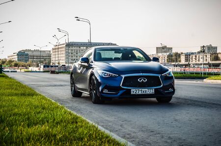 MOSCOW, RUSSIA - SEPTEMBER 1, 2017 INFINITI Q60 coupe car, front-side view. Test of new car - Infiniti Q60 Coupe. Business-class saloon and V6 engine. The premium sports coupe. 405-horsepower V6 engine.のeditorial素材