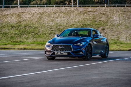MOSCOW, RUSSIA - SEPTEMBER 1, 2017 INFINITI Q60 coupe car, front-side view. Test of new car - Infiniti Q60 Coupe. Business-class saloon and V6 engine. The premium sports coupe. 405-horsepower V6 engine.のeditorial素材