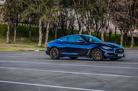 MOSCOW, RUSSIA - SEPTEMBER 1, 2017 INFINITI Q60 coupe car, front-side view. Test of new car - Infiniti Q60 Coupe. Business-class saloon and V6 engine. The premium sports coupe. 405-horsepower V6 engine.のeditorial素材