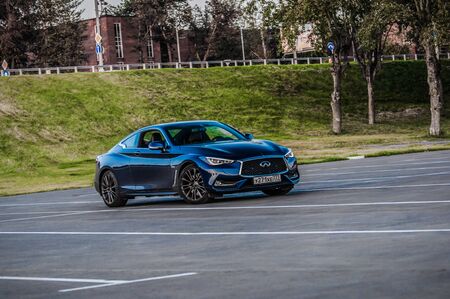 MOSCOW, RUSSIA - SEPTEMBER 1, 2017 INFINITI Q60 coupe car, front-side view. Test of new car - Infiniti Q60 Coupe. Business-class saloon and V6 engine. The premium sports coupe. 405-horsepower V6 engine.のeditorial素材
