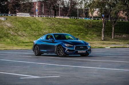 MOSCOW, RUSSIA - SEPTEMBER 1, 2017 INFINITI Q60 coupe car, front-side view. Test of new car - Infiniti Q60 Coupe. Business-class saloon and V6 engine. The premium sports coupe. 405-horsepower V6 engine.のeditorial素材
