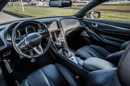MOSCOW, RUSSIA - SEPTEMBER 1, 2017 INFINITI Q60 coupe car, interior view. Test of new car - Infiniti Q60 Coupe. Business-class saloon and V6 engine. The premium sports coupe. 405-horsepower V6 engine.のeditorial素材