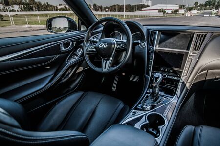 MOSCOW, RUSSIA - SEPTEMBER 1, 2017 INFINITI Q60 coupe car, interior view. Test of new car - Infiniti Q60 Coupe. Business-class saloon and V6 engine. The premium sports coupe. 405-horsepower V6 engine.のeditorial素材