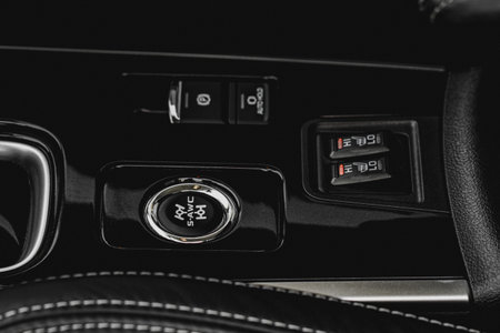 Seat heating and Super All Wheel controller buttons close up view. Car interior. Four-wheel drive...