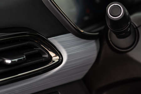Modern car interior close up view with metallic and plastic details. Interior detail.の写真素材
