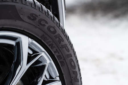 MOSCOW, RUSSIA - FEBRUARY 23, 2021 Pirelli Tires wheel close up view. Pirelli Scorpion model tire logo close up view. Winter tires.のeditorial素材