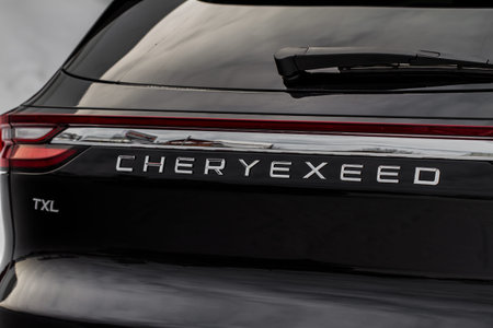 MOSCOW, RUSSIA - FEBRUARY 23, 2021 CHERYEXEED TXL SUV car front side view. Chery Exeed TXL / Vantas...