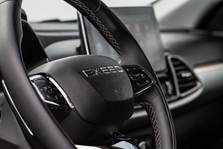 MOSCOW, RUSSIA - FEBRUARY 23, 2021 CHERYEXEED TXL SUV car dark interior close up view. Chery exeed...