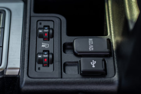 Seat heating controller buttons close up view. Car interior. Seat heater button, car interior.