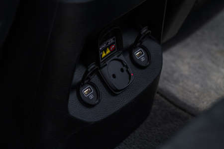 12V and 220v power outlet socket in the car. Opened sockets.の写真素材