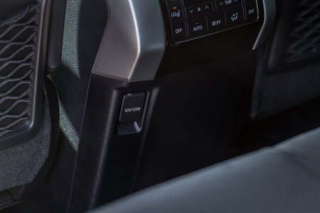 Modern car outlet socket. Closed 12V power outlet socket.