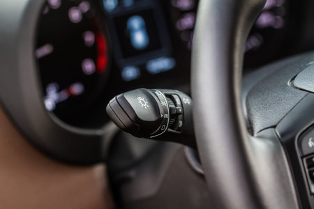 Light switch control. Close up of car light switch and control. Modern car interior detail.