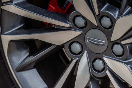 MOSCOW, RUSSIA - MAY 23, 2021 Geely company logo close-up view on the car wheel. Logo of the Chinese...