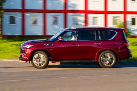MOSCOW, RUSSIA - JUNE 20, 2021 Infiniti QX80 model year 2020 also called Infiniti QX56 in motiom. A...