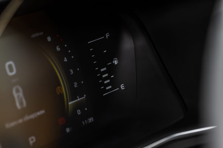 Fuel gauge close up. Car fuel dashboard details.