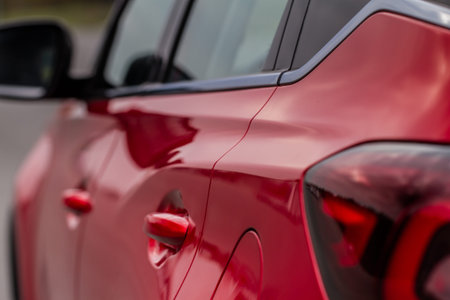 Red Car door handle. Keyless entry car door handle with touch sensor. Access button.