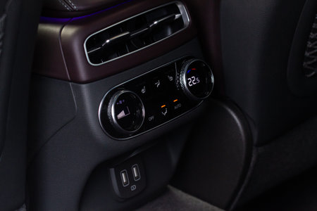 Digital control panel car air conditioner dashboard. Modern car interior conditioning buttons inside...