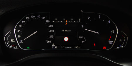 Close up shot with the digital car dashboard. Illuminated car dashboard.