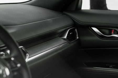 Modern car leather interior details with stitch. car interior details.