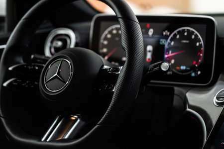 MOSCOW, RUSSIA - FEBRUARY 02, 2022. Mercedes-Benz C-Class 200 (W206) steering wheel close up view. Mercedes-Benz logo on the car steering wheel. compact luxury sedan carのeditorial素材