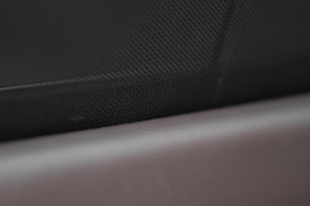 Car side window curtains sunshades with insect screen. Closed sunshade curtain. Sunblind curtain in a modern luxury car.の写真素材