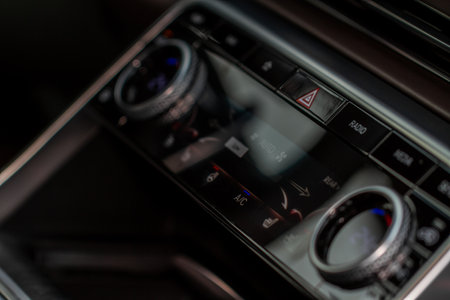Modern car digital automatic climate control system. Car air conditioning system buttons. digital control panel.の写真素材