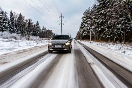 MOSCOW, RUSSIA - DECEMBER 04, 2021 Genesis GV80 (JX1), a modern sedan car. Genesis GV80 in motion view. Genesis JX1のeditorial素材