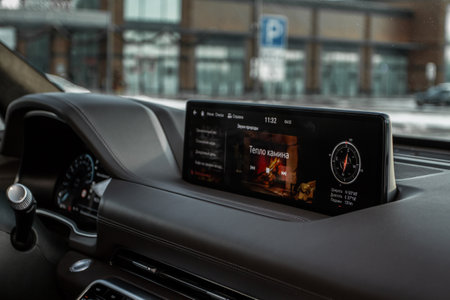 MOSCOW, RUSSIA - DECEMBER 04, 2021 Genesis GV80 (JX1), interior view. Interior close up view. Touchscreen monitor on the dashboard of the car. Close up view to navigation display, car settings. Translation: "Sounds of nature. Fireplace warmth."のeditorial素材