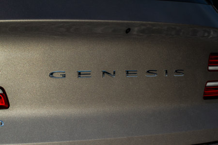 MOSCOW, RUSSIA - DECEMBER 04, 2021 Genesis GV80 (JX1) subcompact luxury SUV car, front-side view. Genesis close-up nameplate logo.のeditorial素材