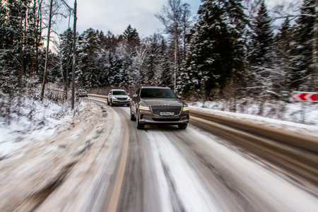 MOSCOW, RUSSIA - DECEMBER 04, 2021 Genesis GV80 (JX1), a modern sedan car. Genesis GV80 in motion view. Genesis JX1のeditorial素材