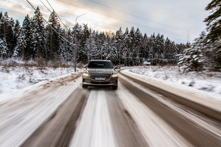 MOSCOW, RUSSIA - DECEMBER 04, 2021 Genesis GV80 (JX1), a modern sedan car. Genesis GV80 in motion view. Genesis JX1のeditorial素材