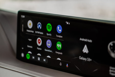 MOSCOW, RUSSIA - DECEMBER 04, 2021 Android Auto on the screen. homescreen. modern car. Interior close up. Car media close up view. homescreen.のeditorial素材
